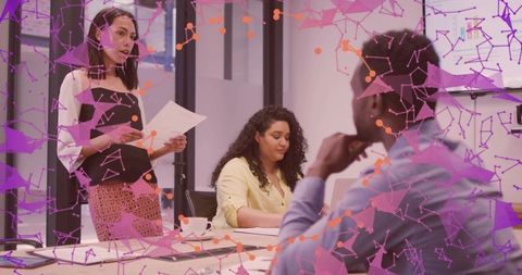 Businesswoman Leading Technological Strategy Meeting with Team