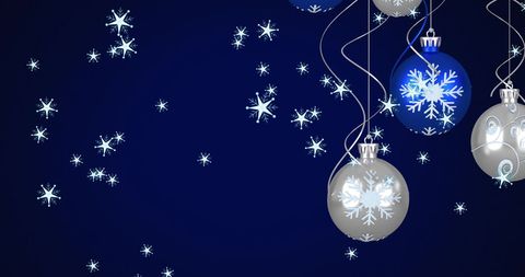 Christmas Baubles and Snowflakes on Blue Background