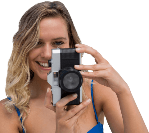 Smiling woman taking picture with vintage camera on transparent background