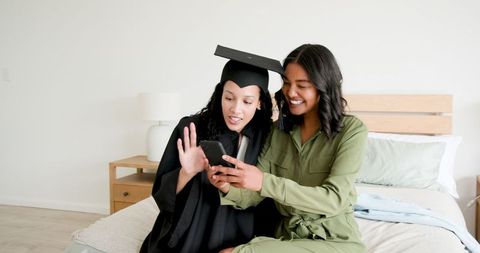 Mother and Daughter Celebrating Graduation Achievement Together