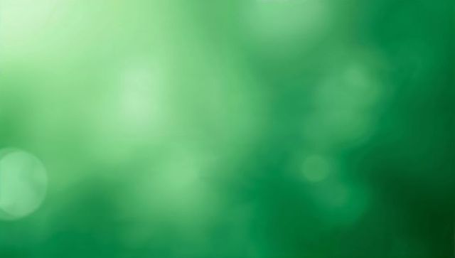 Shimmering mint to emerald gradient with soft bokeh orbs and subtle luminous glow for modern layouts