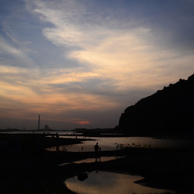 Peaceful Evening Silhouette by Tranquil River with Vibrant Sunset Sky - Download Free Stock Images Pikwizard.com