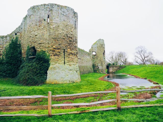 Ancient Stone Castle Ruins with Water Moat on Overcast Day - Download Free Stock Photos Pikwizard.com