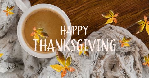 Happy thanksgiving message with coffee and autumn leaves