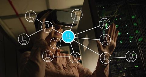 Female it engineer wearing vr headset interacting with avatar network over server rack