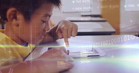 Young Boy Engaging with Technology through Tablet Learning