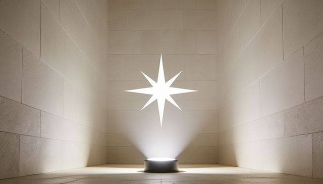 Projecting eight-pointed star in minimalist stone alcove with circular floor light
