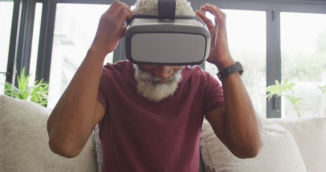 Elderly Man Experiencing Virtual Reality at Home - Download Free Stock Images Pikwizard.com