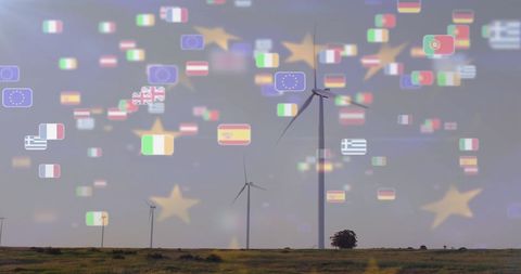 Wind Turbines with Floating National Flags Imagery - Download Free Stock Images Pikwizard.com