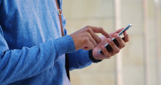 Person Using Smartphone Outdoors in Casual Wear - Download Free Stock Images Pikwizard.com