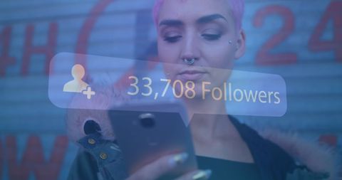 Influencer Viewing Growing Follower Count on Smartphone