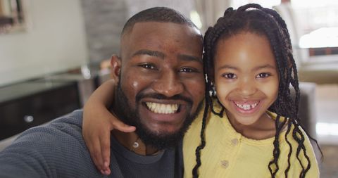 Smiling African American Father and Daughter Taking Selfie Indoors - Download Free Stock Images Pikwizard.com