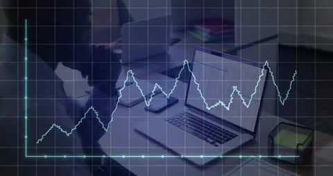 Businessman Analyzing Financial Graph with Technology