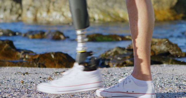 Active Person with Prosthetic Leg Walking by the Beach - Download Free Stock Images Pikwizard.com