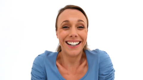 Capturing a moment of sheer joy, this visual is perfect for advertising or promotional material related to wellness, positive emotions, or cheerful themes. Can illustrate subjects such as consumer satisfaction, delight, conveying good news, and happiness in personal or professional settings when used in presentations or blog posts.