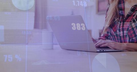 Professional Woman Typing on Laptop in Modern Office with Chart Overlay
