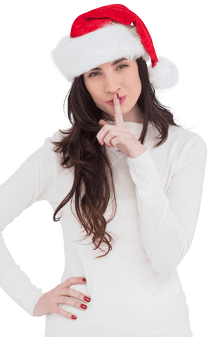 festive woman in santa hat conveying christmas secret gesture - Download Free Stock Videos Pikwizard.com