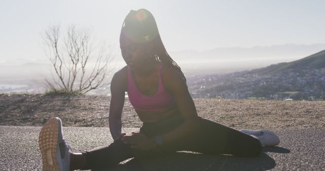 Female Athlete Stretching Outdoors at Sunrise - Download Free Stock Images Pikwizard.com