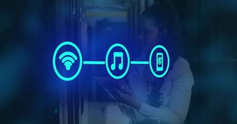 Technician monitoring datacenter connectivity with digital icons