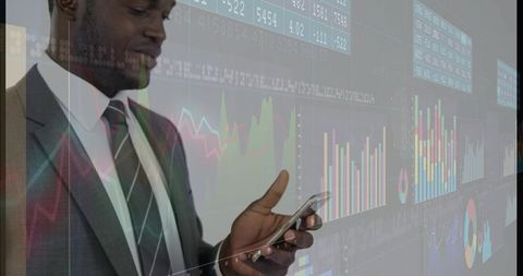 Business professional monitoring financial charts on smartphone