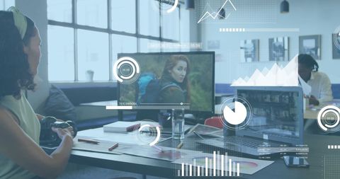 Young Professionals Analyzing Data in Modern Trendy Office