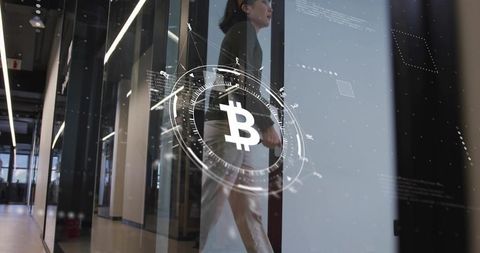 Asian Businesswoman Walking Near Enigmatic Bitcoin Holograph