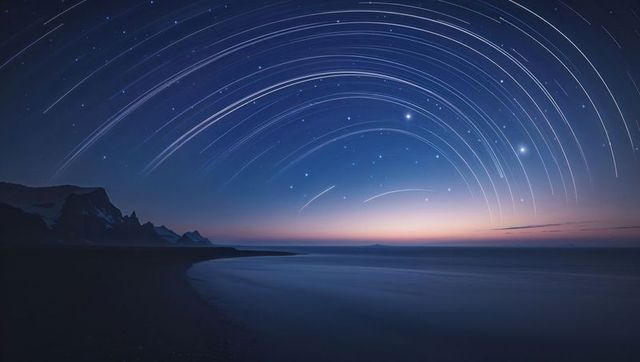Star Trails Over Twilight Bay with Silhouetted Mountains