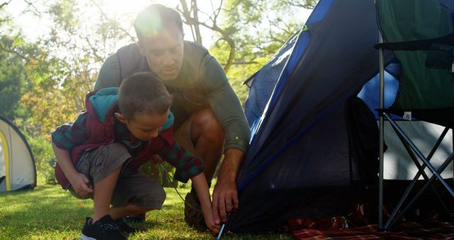 Father and Son Enjoying Camping in Sunny Outdoors - Download Free Stock Images Pikwizard.com