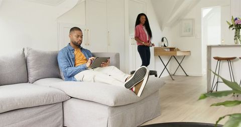 Couple Enjoying Relaxed Time at Home in a Modern Living Room