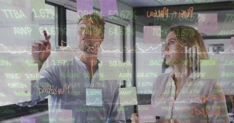 Business Professionals Brainstorming with Digital Financial Interface