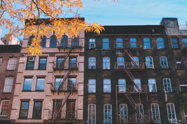 Perfect for illustrating charming urban neighborhoods, showcasing historic architecture, and highlighting autumn in the city. Useful for real estate, travel, and seasonal editorial content.