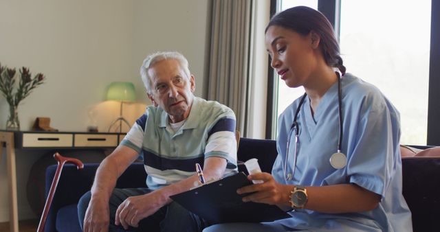 Home Nurse Providing Medical Care to Elderly Man - Download Free Stock Images Pikwizard.com