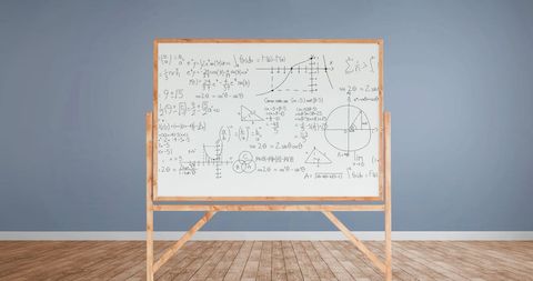 Mathematical problems and diagrams on whiteboard