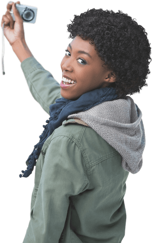 Smiling Woman Taking Selfie with Retro Camera on Transparent Background - Download Free Stock Videos Pikwizard.com