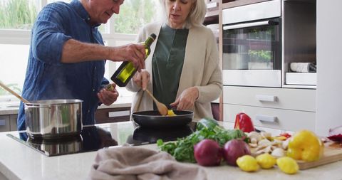Senior Couple Cooking Healthy Meal Together in Modern Kitchen - Download Free Stock Images Pikwizard.com