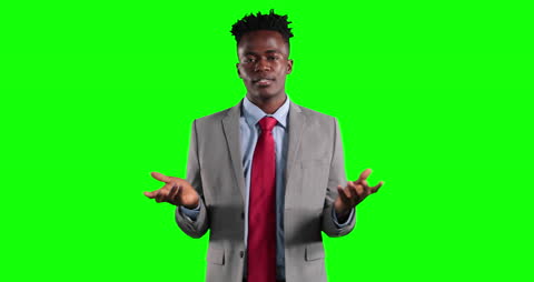 Businessman Gesturing While Talking on Green Screen