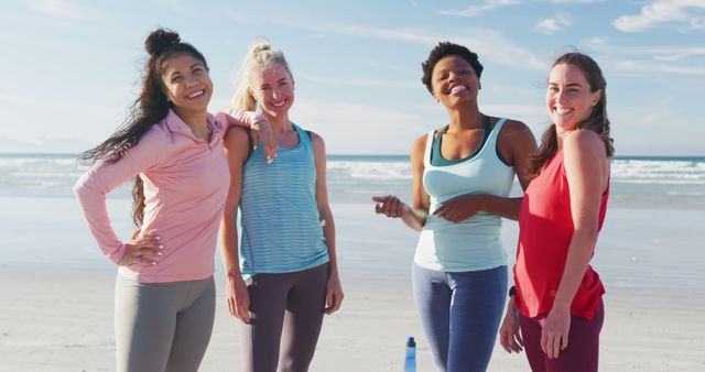 Portrait of happy group of diverse female friends having fun at the beach. holiday, freedom and leisure time outdoors.