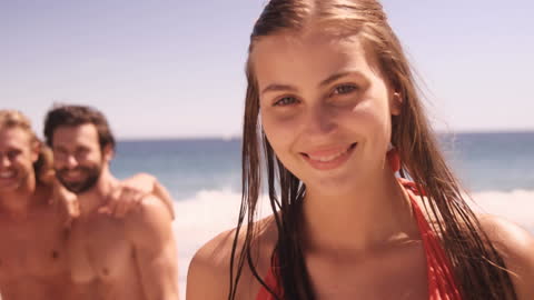 Smiling Friends Enjoying Beach Summer Fun