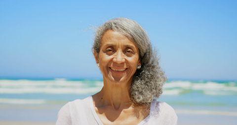 Senior African American Woman Smiling on Scenic Beach