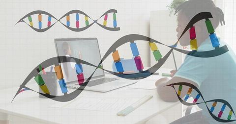 E-learning meets genetics: boy studying online with dna illustration overlay