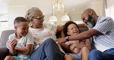 Multigenerational Family Laughing Together at Home