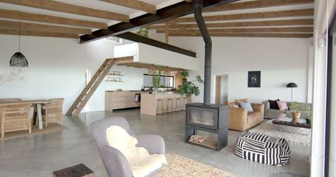 Modern Open-Concept Living Room with Wood-Burning Stove