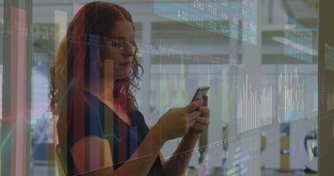 Business Analyst Using Smartphone with Data Charts Projection in Modern Office