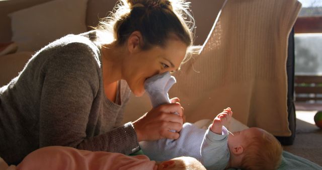 Mother Bonding with Baby in Warm Living Room - Download Free Stock Images Pikwizard.com