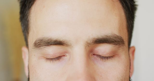 Image close up portrait of the eyes of smiling caucasian man, with copy space. Happiness, relaxation and domestic life.
