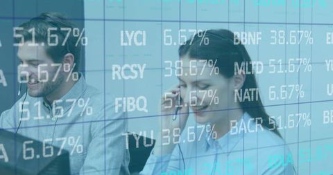 Focused professionals collaborating in data-driven workspace