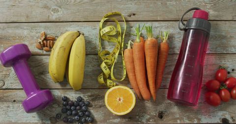 Healthy Lifestyle Essentials with Fruits, Water Bottle, and Dumbbell - Download Free Stock Images Pikwizard.com