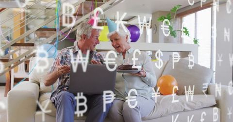 Elderly Couple Celebrating Birthday with Technology Amid Currency Symbols