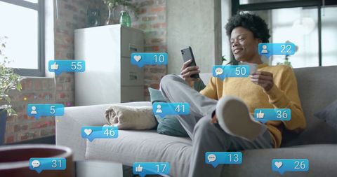 Engaged Man Interacting with Social Media Notifications at Home