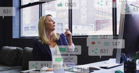 Businesswoman Analyzing Social Media Engagement Metrics Office